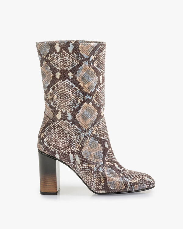 Brown and white leather boots with snake print