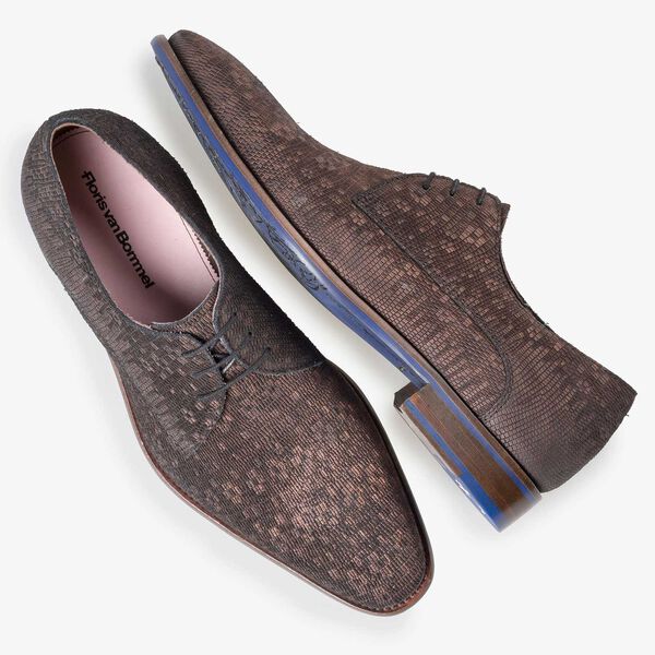Brown lace shoe with structural pattern