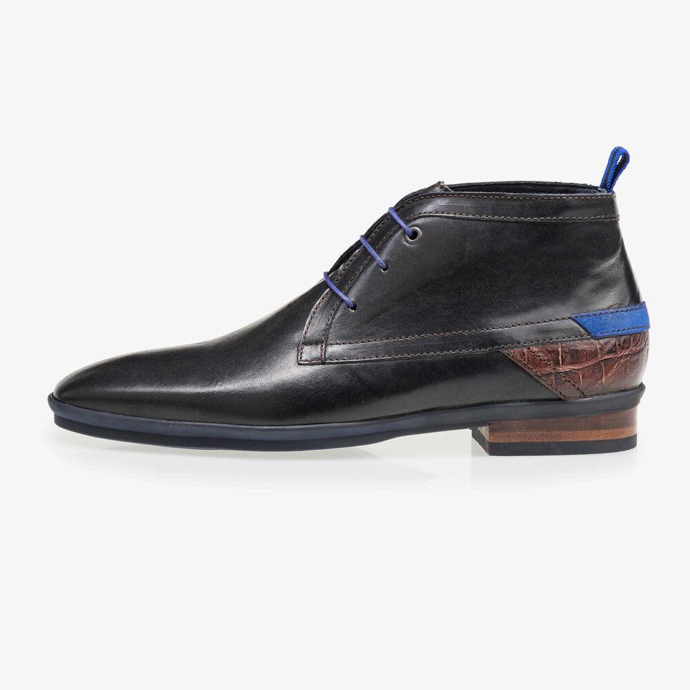 Mid-high black leather lace boot