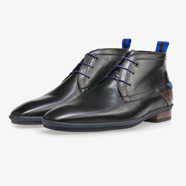 Mid-high black leather lace boot