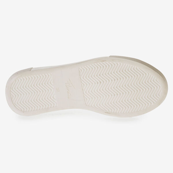 White leather sneaker with black print