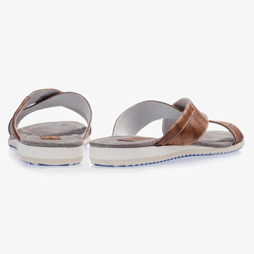 Cognac-coloured leather slipper with cross straps and croco print