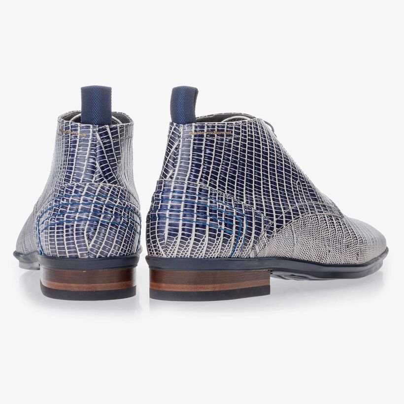 Blue leather lace boot finished with a lizard print