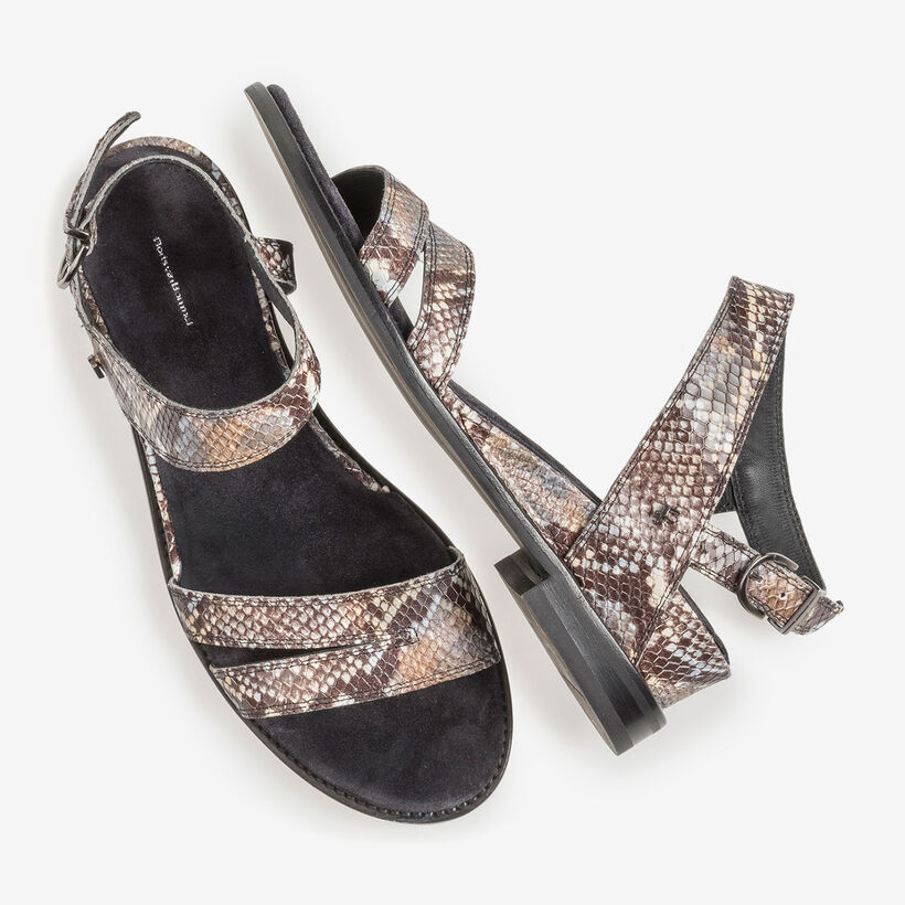 Brown and white leather sandals with snake print